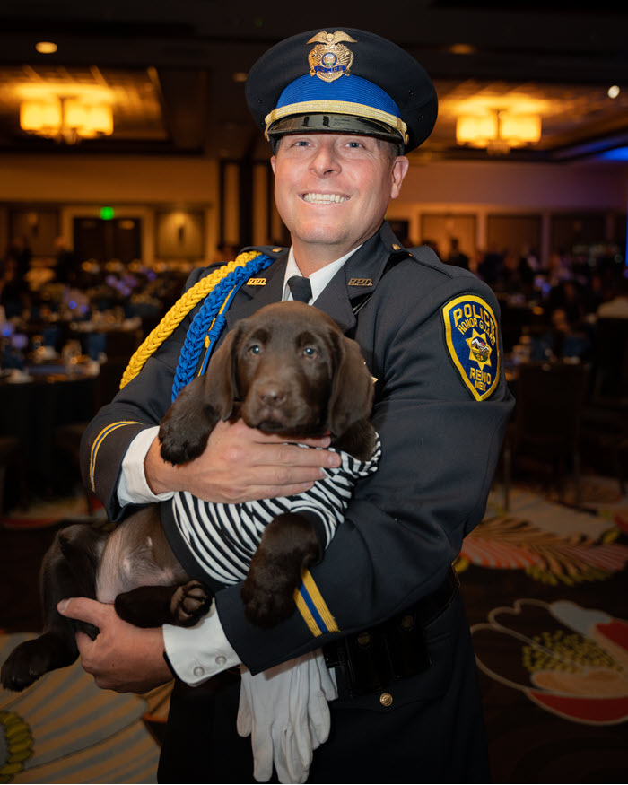 officer and happy pup.jpg